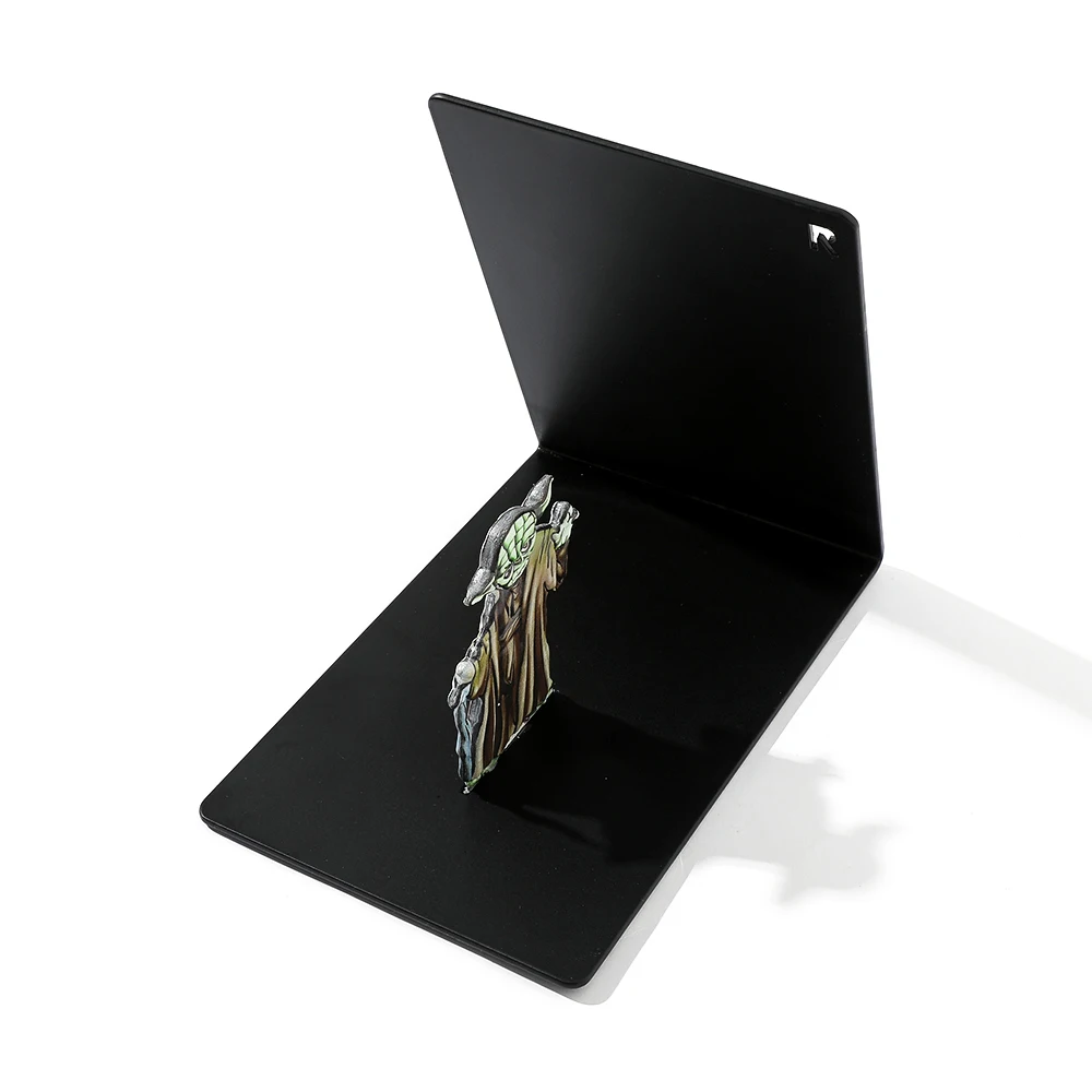

Creative electrophoretic black cartoon alien cartoon girl heavy-duty metal bookshelf for perfect storage of book blocks.