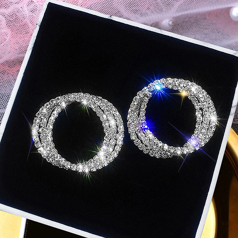 

Huitan Luxury Micro Paved Dazzling Crystal CZ Classic Women Stud Earrings Silver Color Twine Round Shape Versatile Lady Jewelry