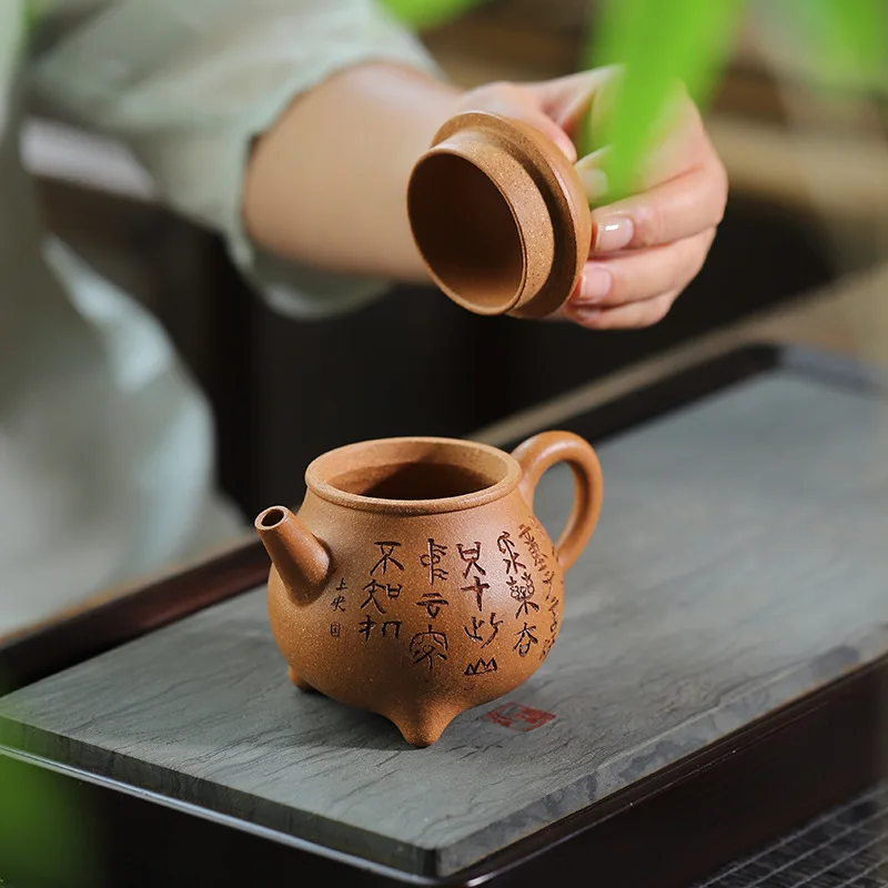 Distribution agent Yixing purple sand handmade teapot raw ore downhill mud three-legged milk ding kung fu teaset purple clay po