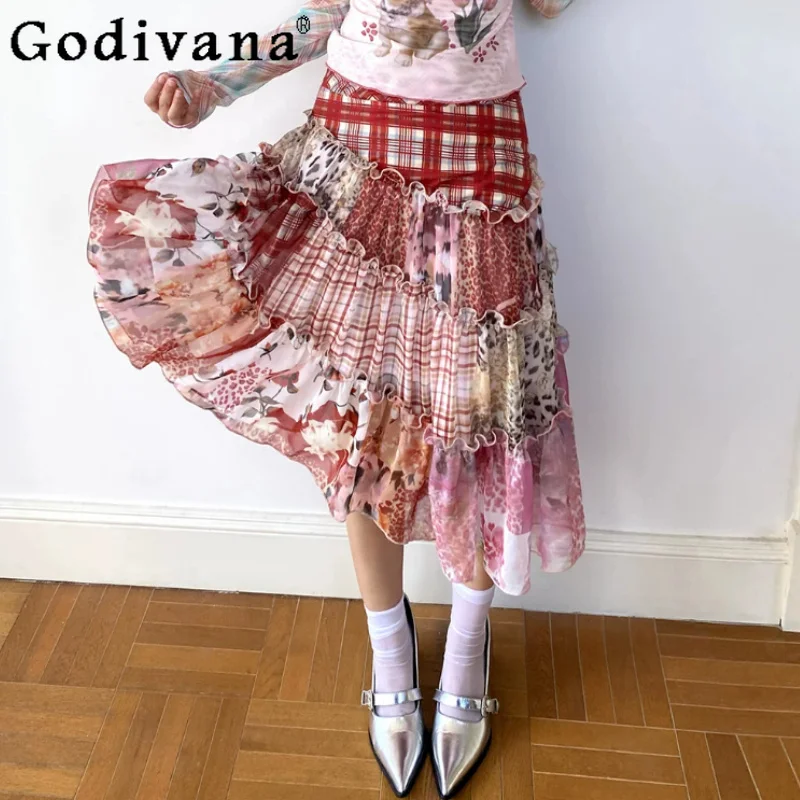 Summer new personality irregular splicing plaid leisure cake skirt fashion girl loose versatile European American print skirts