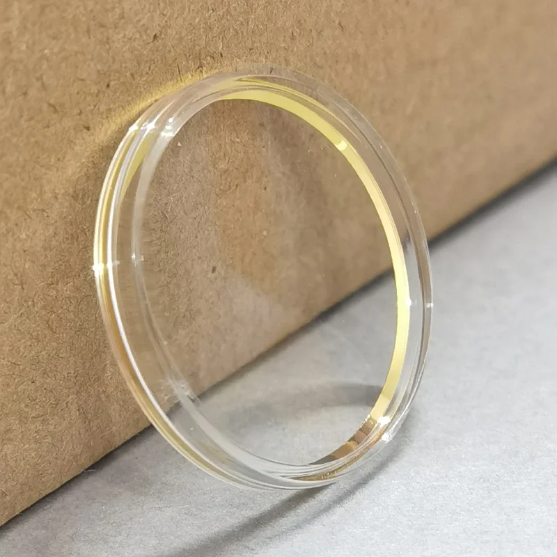 Uhrenglas mit Kunststoffdeckel in Form eines 21 mm bis 30,8 mm großen Durchmesserzahlenringes mit gelbem Spannring für die Uhrenreparatur GD180