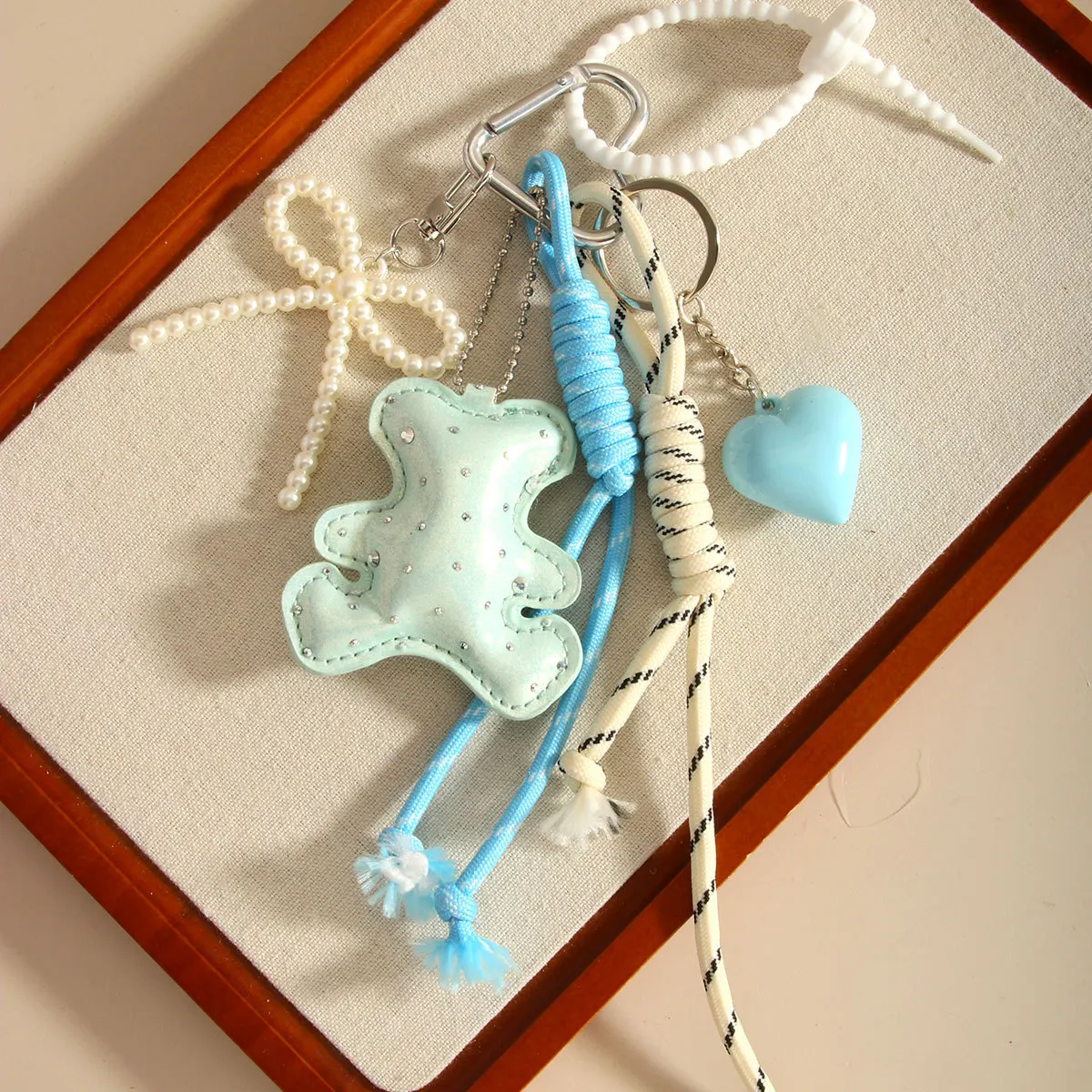Leather Cute Bear Blue Lanyard Heart Keychain Pearl Hand Braided Rope Roman Knot Bow Keychain Bag Pendant Charm for Women