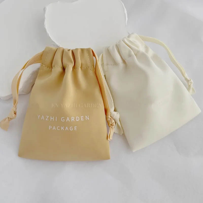 

Customized Logo Wholesale Luxury Dense Silk Satin Dust Sack Beauty Makeup Jewelry Drawstring Pouch