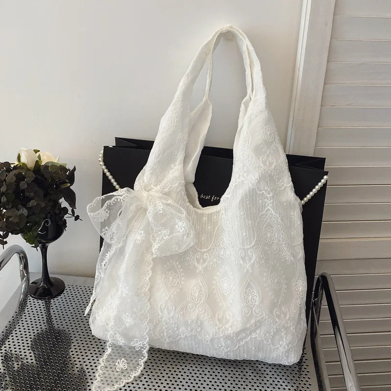 Neu eingetroffene Damen-Tragetasche aus Canvas mit floraler Spitze im koreanischen frischen Stil, große Kapazität