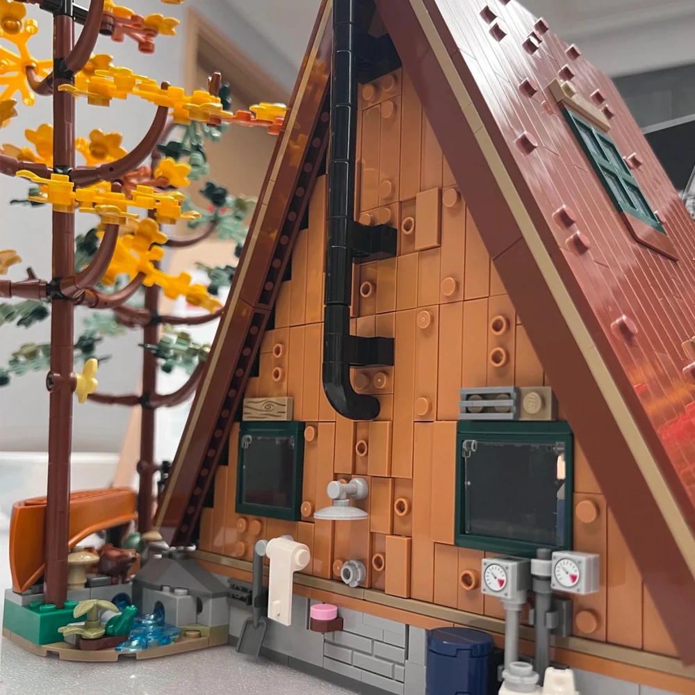 2024 NEU Auf Lager A-Frame Cabin Forest House 21338 Bausteine mit Beleuchtung City Street View Bausteinspielzeug Kindergeschenke