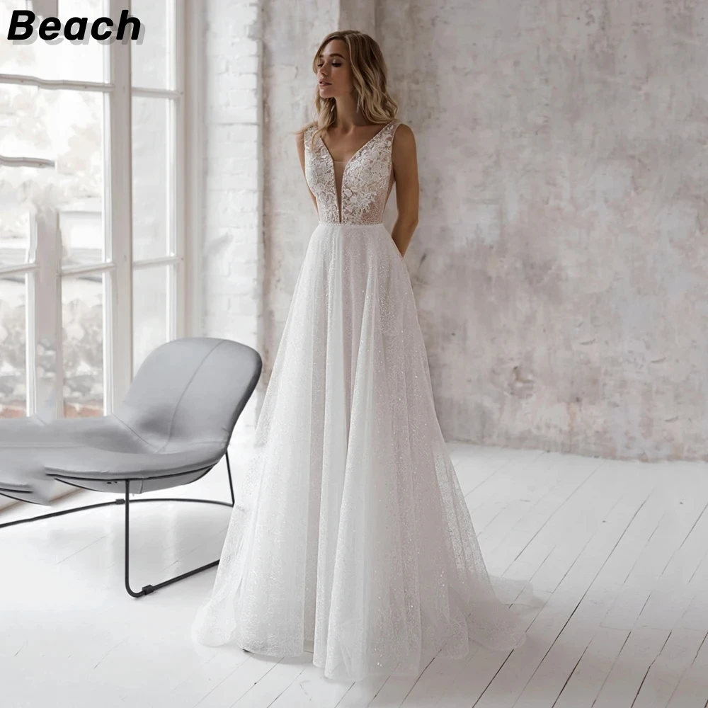 

Beach Elegant Backless A-Line Wedding Dress V-Neck Lace Appliques Sleeveless Beading Bridal Gown Sexy Brides Dress With Pocket