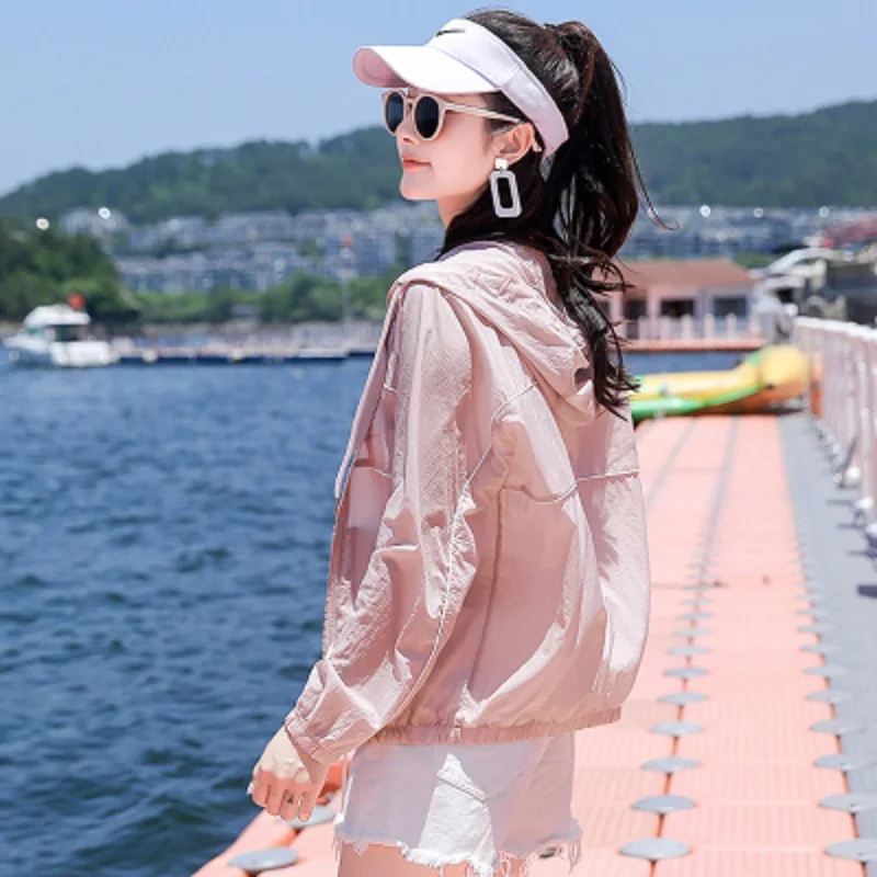 Long sleeved sun protection clothing for women, new summer loose fitting UV resistant short style sun protection thin jacket