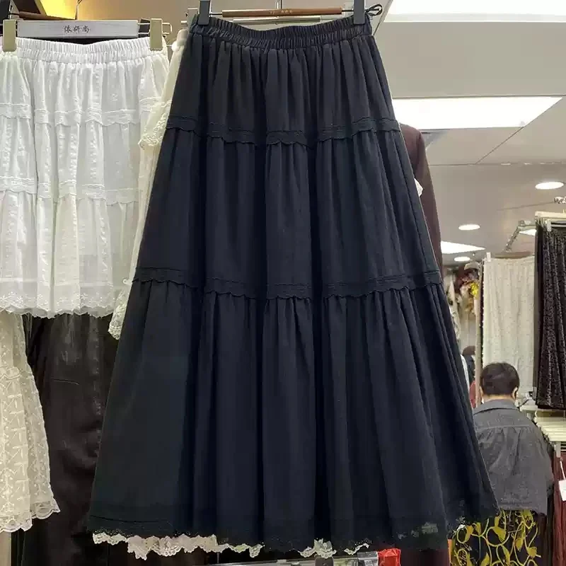 Gonna a trapezio da donna nuova primavera Sle con patchwork di pizzo ricamato Gonna torta con bottoni in puro colore a vita media in misto cotone