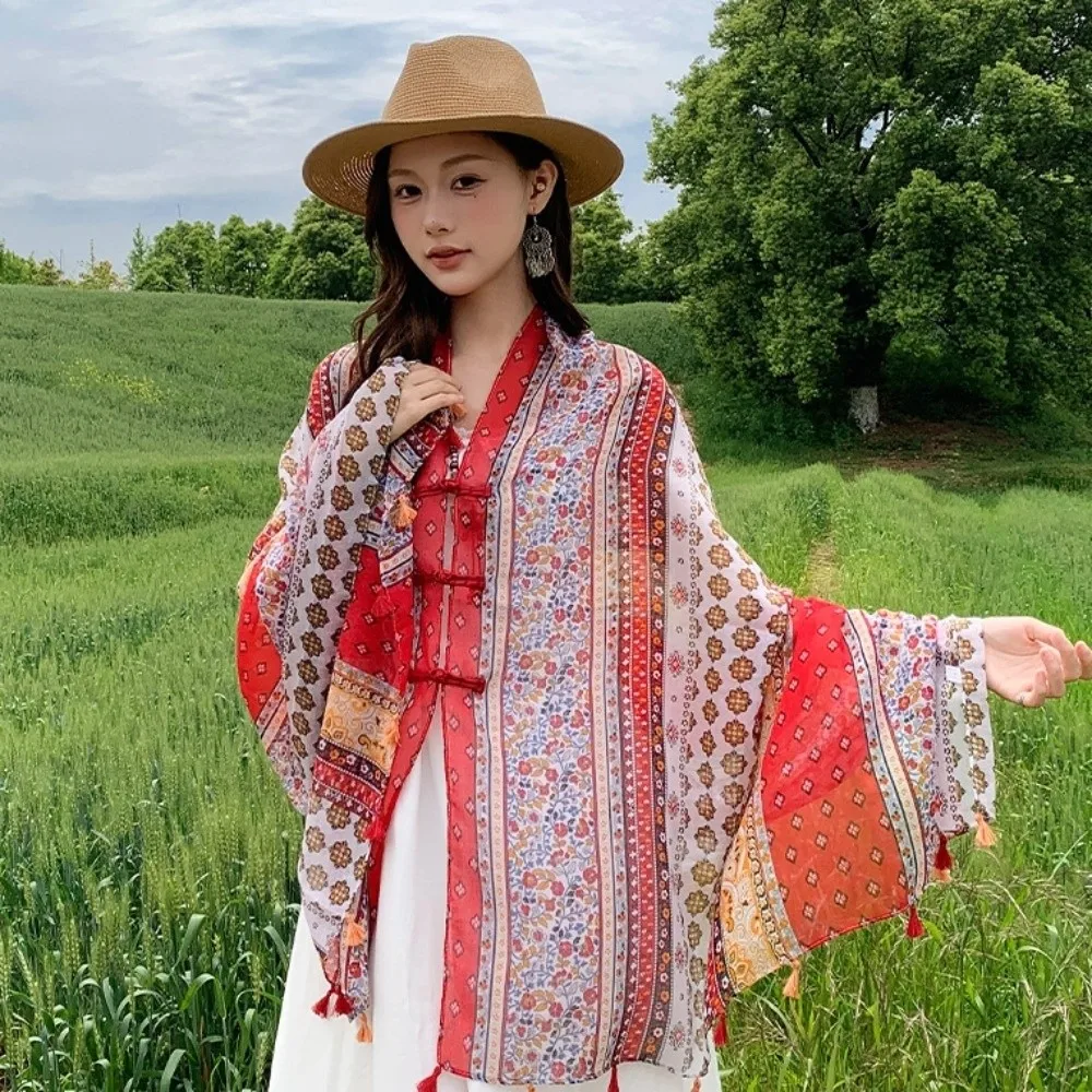 Elegante nudo botón protector solar bufanda chal Paisley borlas cárdigan capa flor suave estilo nacional capa al aire libre