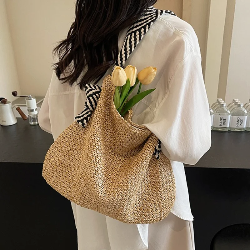 

Новинка 2024 года, соломенная сумка большой вместимости, женская модель, приморская праздничная вязаная сумка на плечо, подмышки, повседневная универсальная сумка через плечо, сумка-тоут