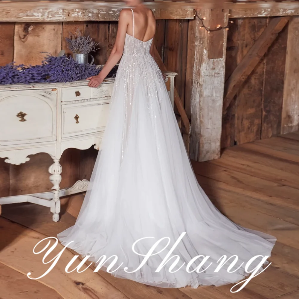 Yunshang Customized Spaghetti Strap Sleeveless Sweep Train Floor Length Backless Traditional Wedding Dress Charming High quality