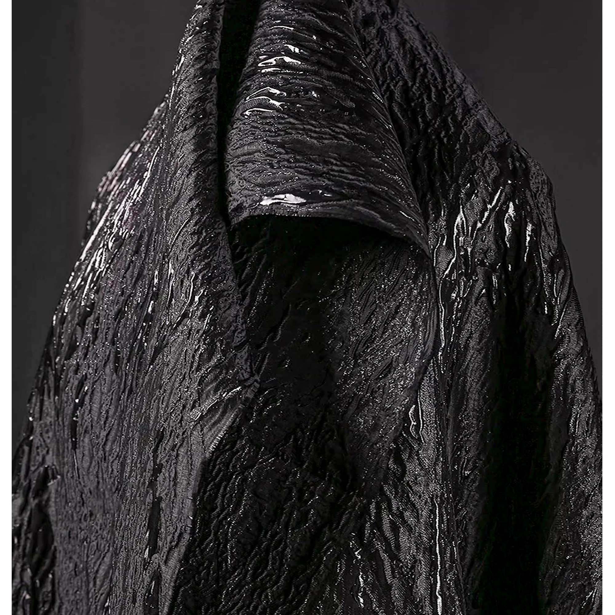 Pure black undulating vein gilt jacquard fabric texture gloss stiff coat creative clothing designer fabric