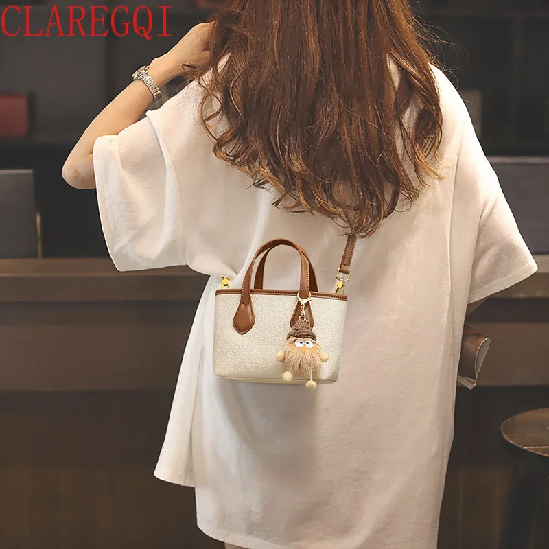 New niche versatile, fashionable, high-end crossbody bucket  leather handbags, small luggage and bags