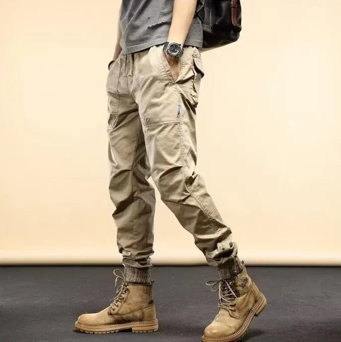 Neue amerikanische Retro Outdoor Hip Hop Workwear Hose für Herren trend ige elastische Taille Reiß verschluss einfache große Tasche gebunden Freizeit hose