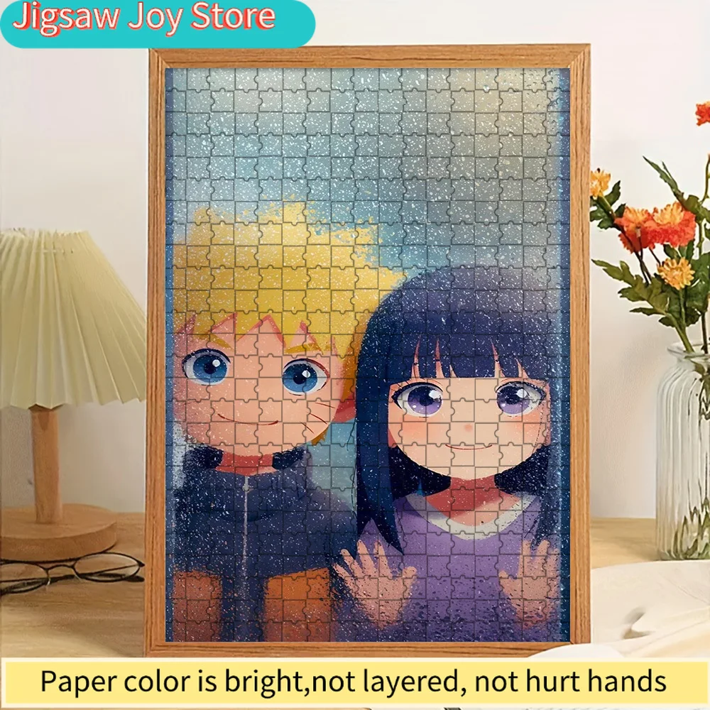 

Naruto Uzumaki & Hinata Hyuga Chibi Paper Puzzle, Cute Anime Couple Art with Glittery Blue Background, Adorable Chibi Style Illu