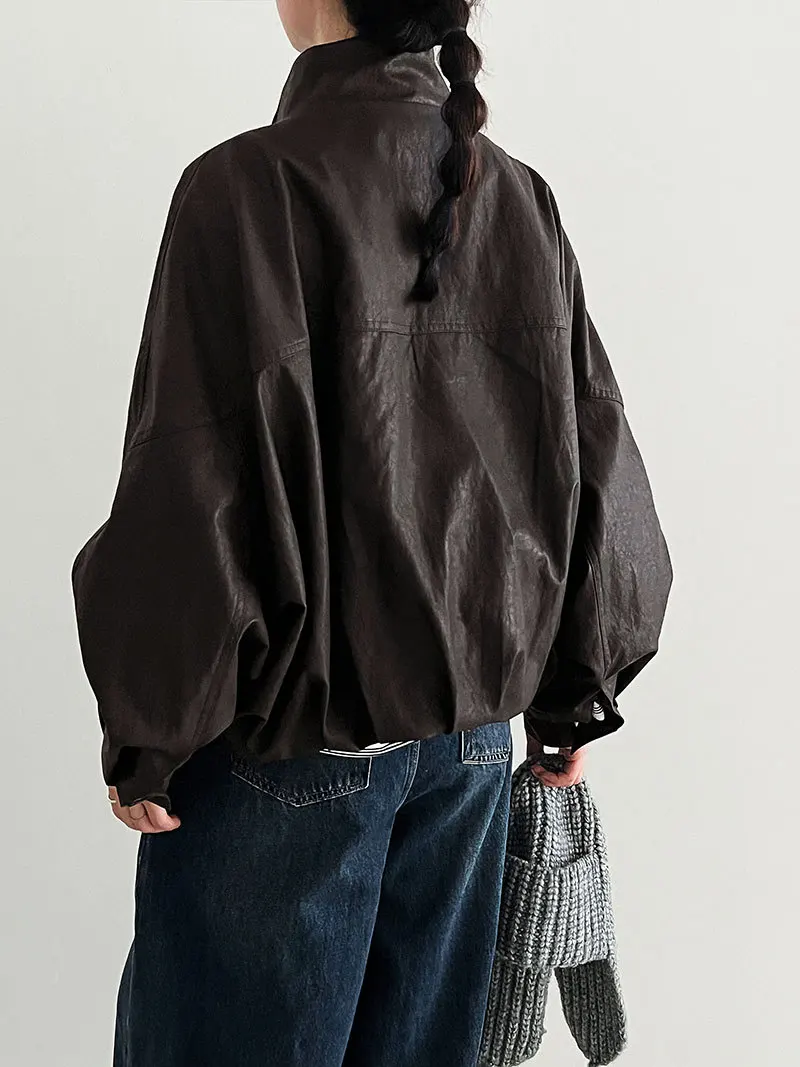 Modische koreanische lässige Retro-PU-Lederjacke für Damen im Herbst im neuen Stil mit lockerer Blütenknospen-Silhouette
