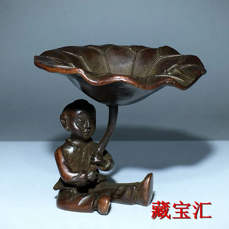 

Rural secondhand goods Lotus leaf boy playing nostalgic bronze hand-held tea pet home candlestick incense seat