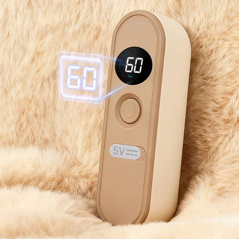 Split style hand warmer with magnetic suction and LCD display for temperature independent heating, changing from one to two view 6