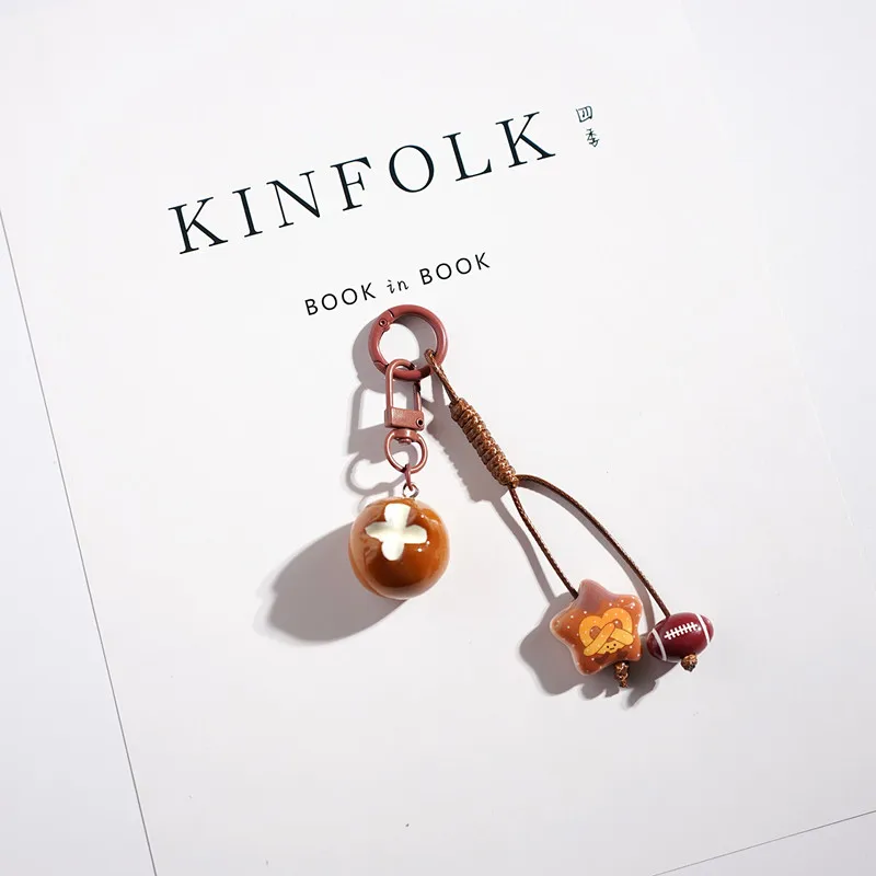 新しい可愛い漫画風アルカリ水パンキーホルダーペンダントバッグペンダント小さなギフト車学校バッグリトルレッドブック