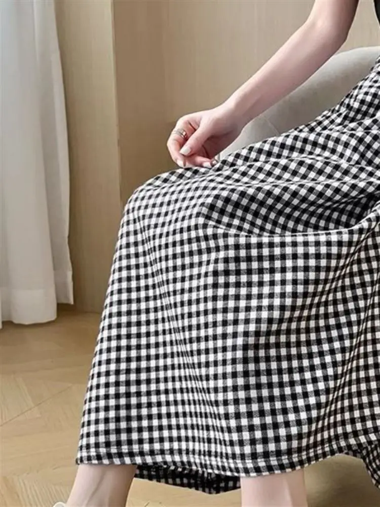 تنورة صيفية رفيعة منقوشة باللون الأسود للنساء عالية الخصر للتخسيس مقاس صغير غير رسمي على شكل حرف a تنورة طويلة نصف الجسم نمط ...