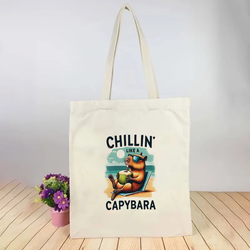 1 Printed Canvas Tote Bag Vacation Capybara Relaxing Drinking Coconut Theme Unisex Breathable Trucker Style. Portable White Cros