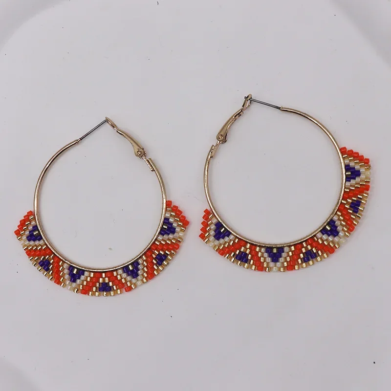 

Beaded earrings Circle Rainbow Colour Design Hand knitting Bohemia Alloy Tide Simple Rice bead earrings