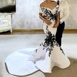 BridalAffair White Mermaid Evening Dress Off the Shoulder Black Appliques Lace Matt Satin Prom Gowns Court Train Women Dresses