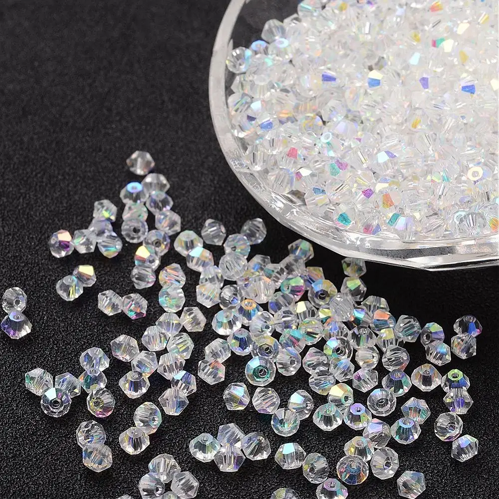 Imitation Crystallized Glass Beads AB Color Faceted Bicone Clear AB Size: 4mm in diameter 3.5mm thick hole: 1mm 720pcs/bag.
