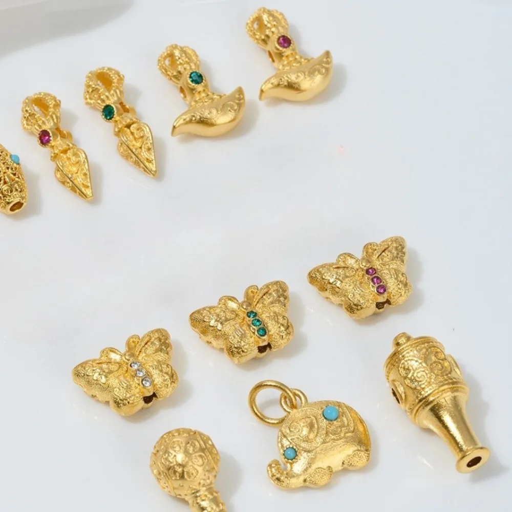 

Sand Gold Accessories Zirconium Pestle Knife Butterfly Baby Elephant Bead-separated Buddha Head Tee Beaded Jewelry Material