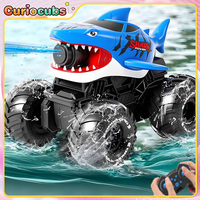 Amphibious RC Car 2.4G Gesture Sensing Shark Racing Vehicle Water Spray Stunt Car Automatic Water Absorption Outdoor Toy Gift