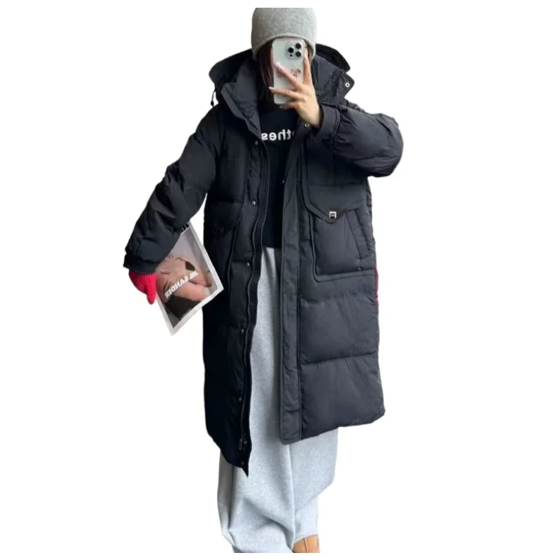 Chaqueta larga de plumón para mujer, moda de invierno 2025, estilo viajero, abrigo cálido adelgazante versátil y grueso elegante a la moda