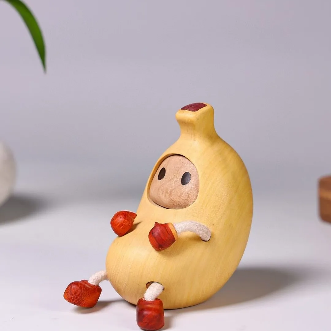 

Hand Carved Boxwood Wooden Banana Man Figurine - Cute Creative Desktop Ornament Stress Relief Gift Collectible