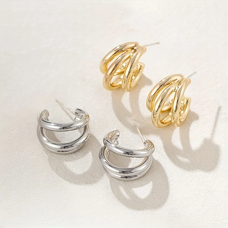 Pendientes dorados hipoalergénicos de alta calidad, resistentes a la decoloración, cómodos y versátiles. Simples y elegantes, son ideales para el uso diario o para ocasiones festivas.