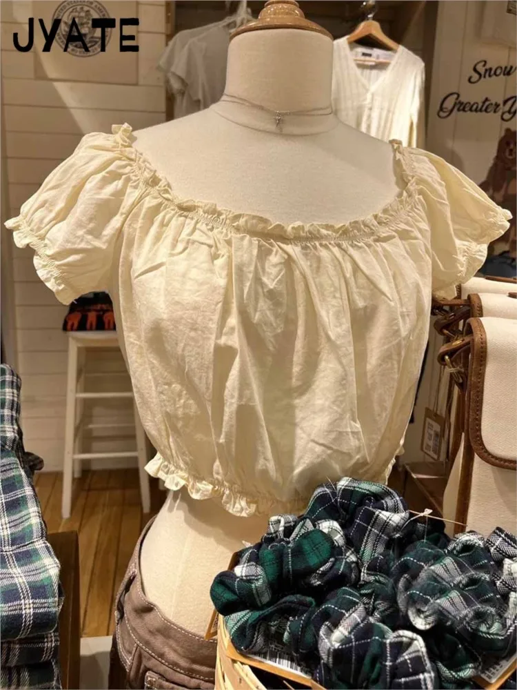 

Новые милые бежевые эластичные футболки с рюшами и рукавами, женские летние хлопковые повседневные простые элегантные укороченные топы в винтажном сказочном стиле, милые футболки