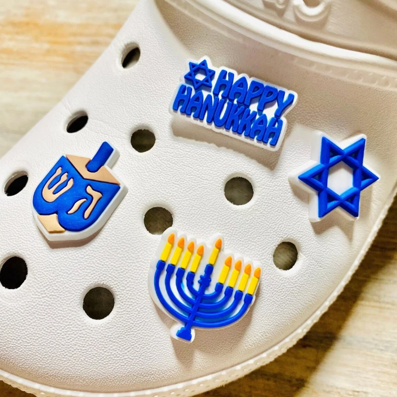 

Winter Holidays Collection Multi Pack Shoe Charms | Hanukkah Set | 4 Piece Blue Hanukkah Christmas Jewish Shoe Charm Set