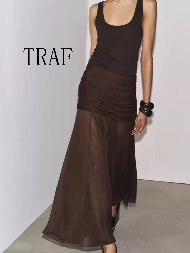

TRAF European and American style summer new fashion temperament mid-waist asymmetrical hem translucent pleated design skirt