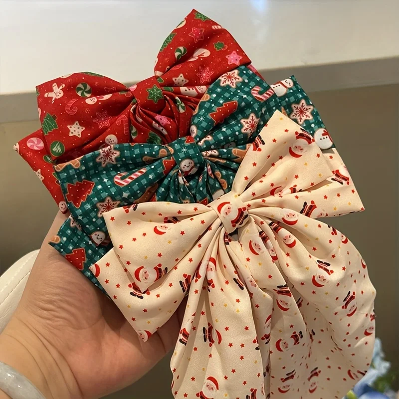 Weihnachts-Haarspangen mit doppellagiger Schleife für Weihnachtsmann und Schneemann – bedruckter Urlaubs-Haarschmuck mit roter und gestreifter Schleife aus Stoff – Detail 3