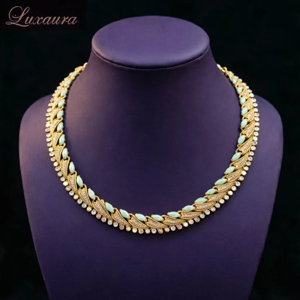 

Vintage jewelry featuring a fashionable and classic gold geometric necklace design paired with Bohemian style women's necklace