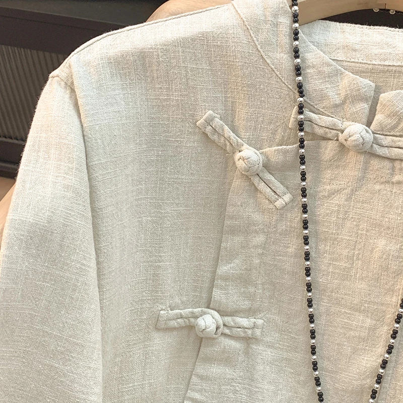 ربيع جديد Sle فضفاض طويل Sve القطن الكتان irt الرجعية زر الوقوف طوق الجانب زلة الشاي زي تي شيرت لون نقي العصرية