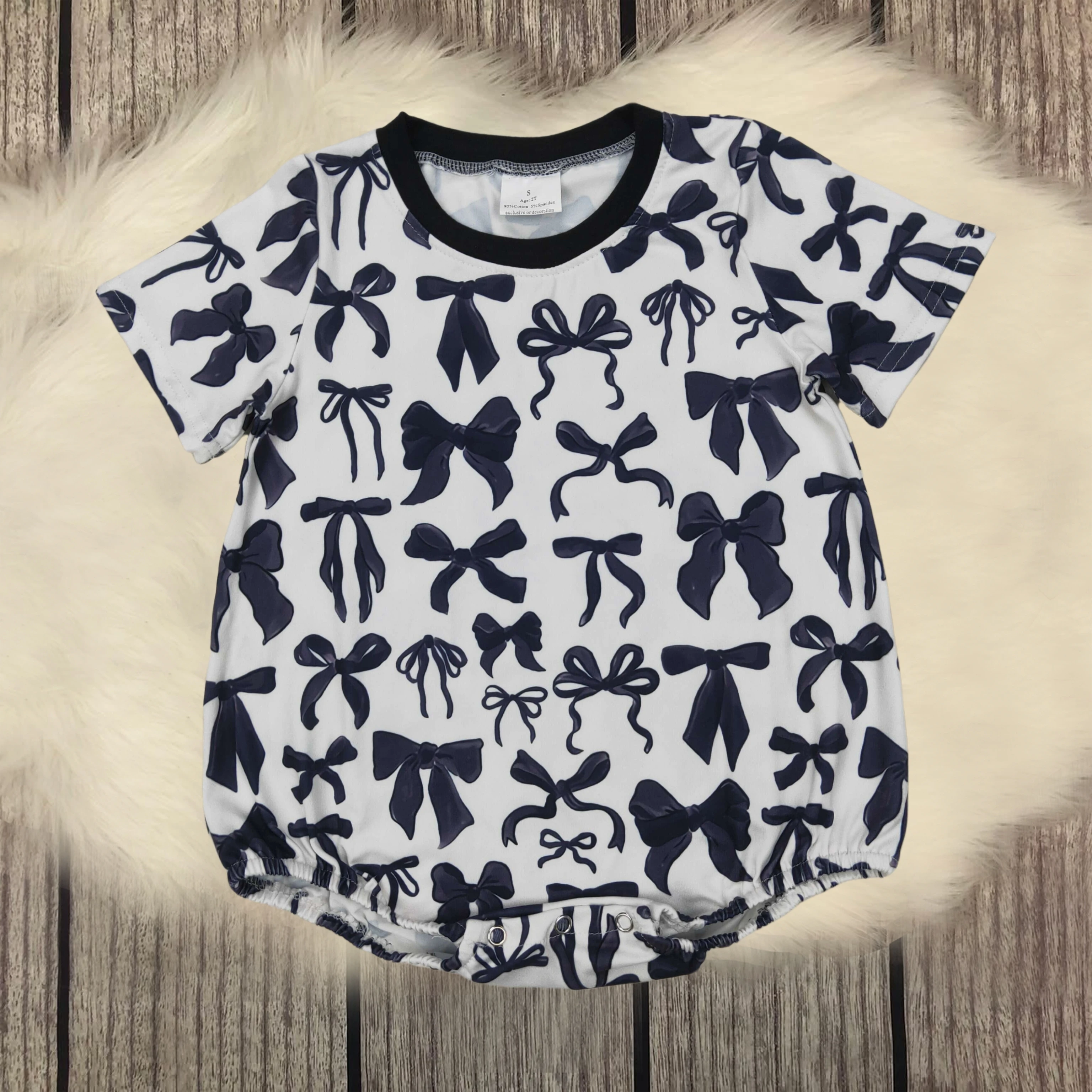 

Wholesale Hot Sale Infant Baby Girls Short Sleeve Rompers Black Bows Rompers Boutique Baby Onesies Toddler Girls Bubble Rompers