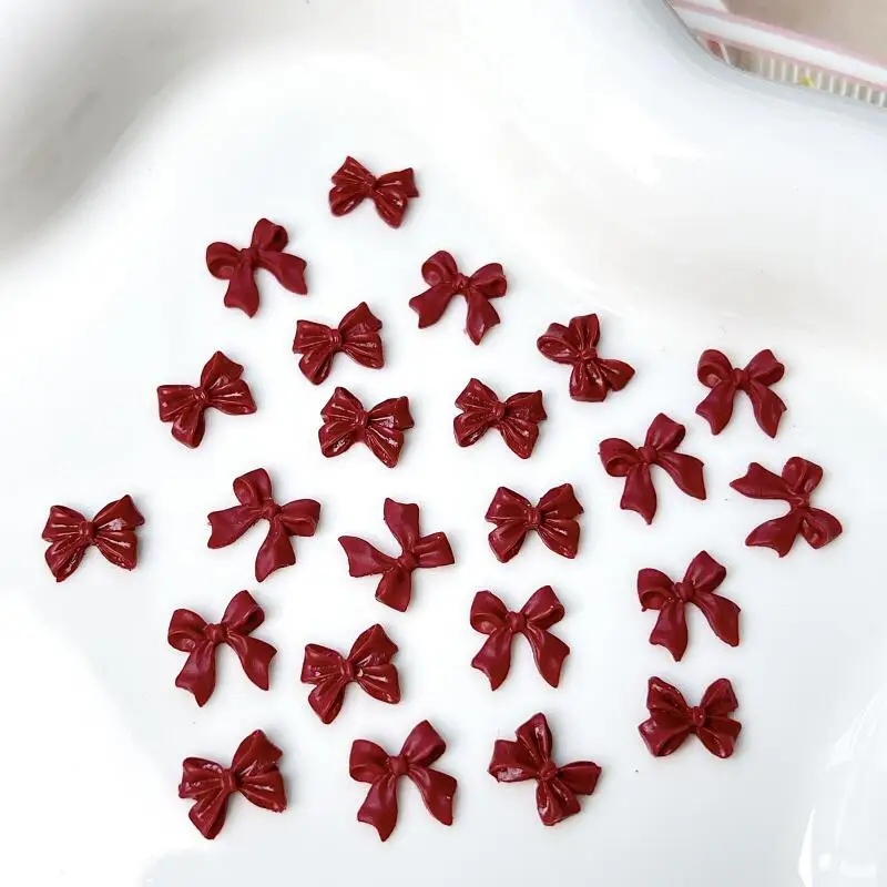 100 pçs clássico vinho vermelho fita bowknots decorações da arte do prego 3d minimalista gravata resina encantos do prego acessórios para diy peças de unhas
