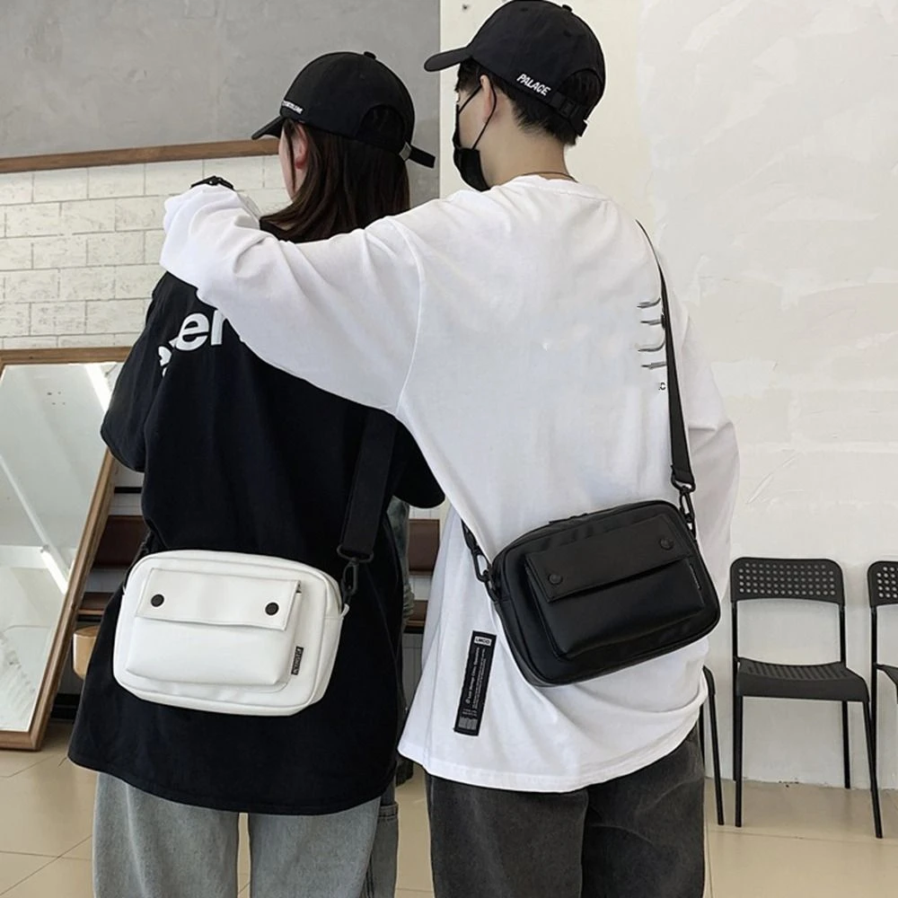 حقيبة رسائل مربعة على الطراز الكوري كاجوال ذات سعة كبيرة من البولي يوريثان حقيبة كروس بلون سادة حقيبة كتف رياضية