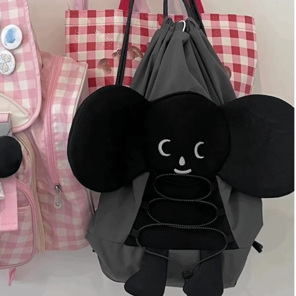 トレンディなカジュアル漫画バックパック巾着大容量人形スクールバッグ軽量愛らしい黒ダブルショルダーバッグデイリー