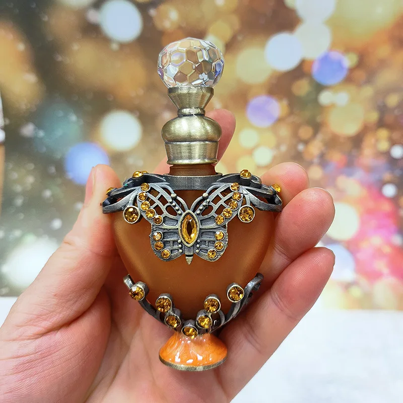 Dubai metal jewellery model perfume bottle dispensing empty bottles essential oil bottle glass bottle 12ML heart-shaped perfume