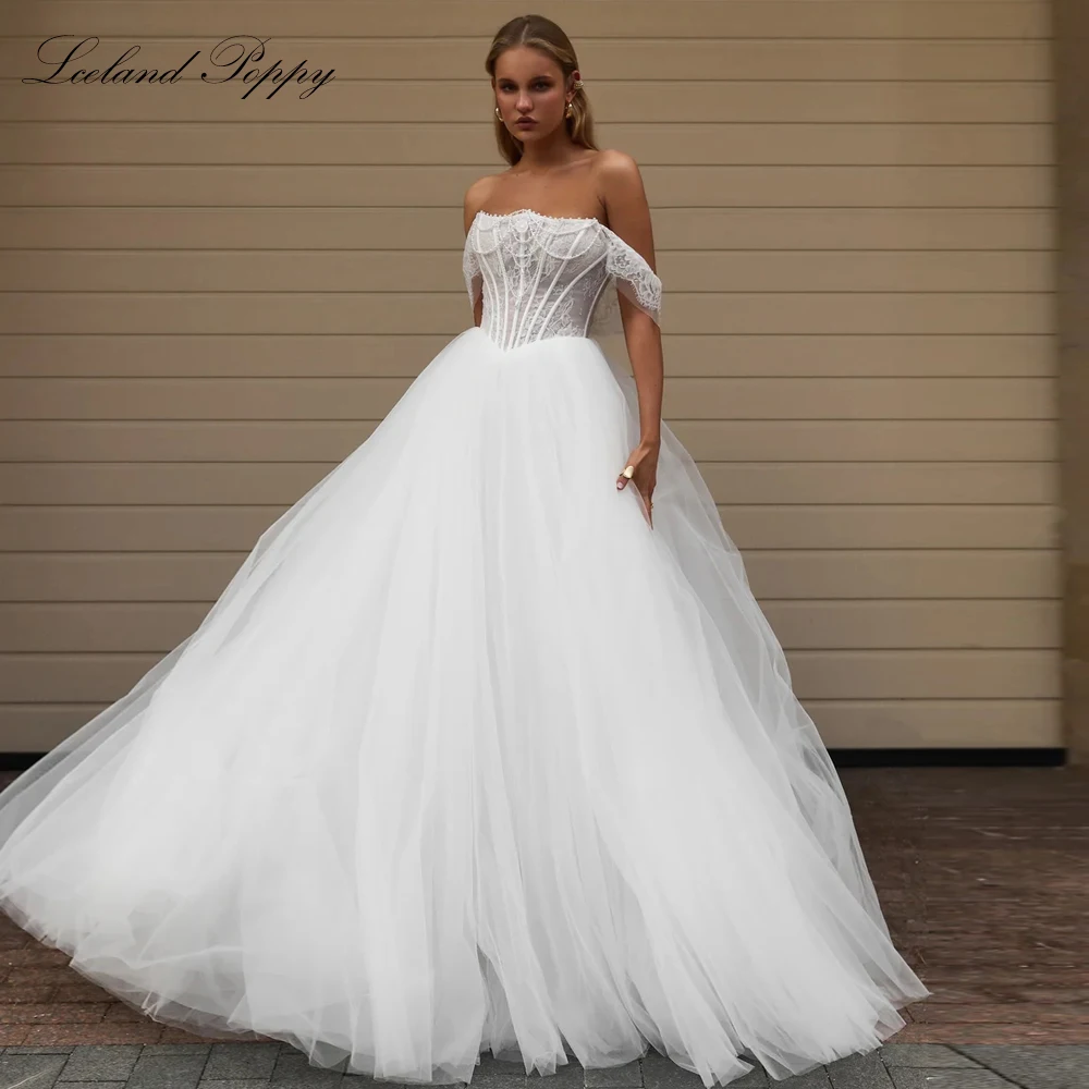 Lceland Poppy Customized A Line Illusion Lace Wedding Dresses Floor Length Boat Neck Bridal Gowns with Court Train