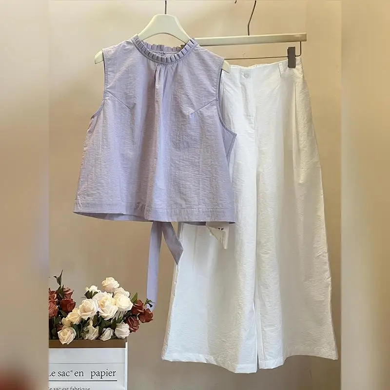 Estate New Sle Coreano Viola con cintura Svel Top con pantaloni con bottoni Set in due pezzi Giacca a vento per pendolari alla moda