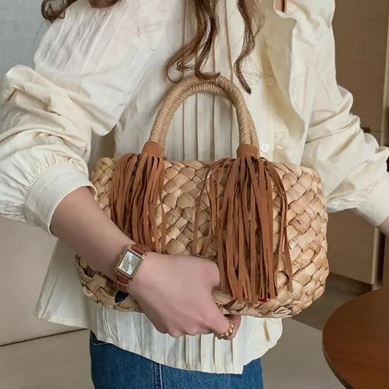 

Summer Fashion New Hollow Woven Tassel Bucket Shaped Hand-held Women's Bag Casual Fashion Beach Travel Vacation Beach Bag Trendy