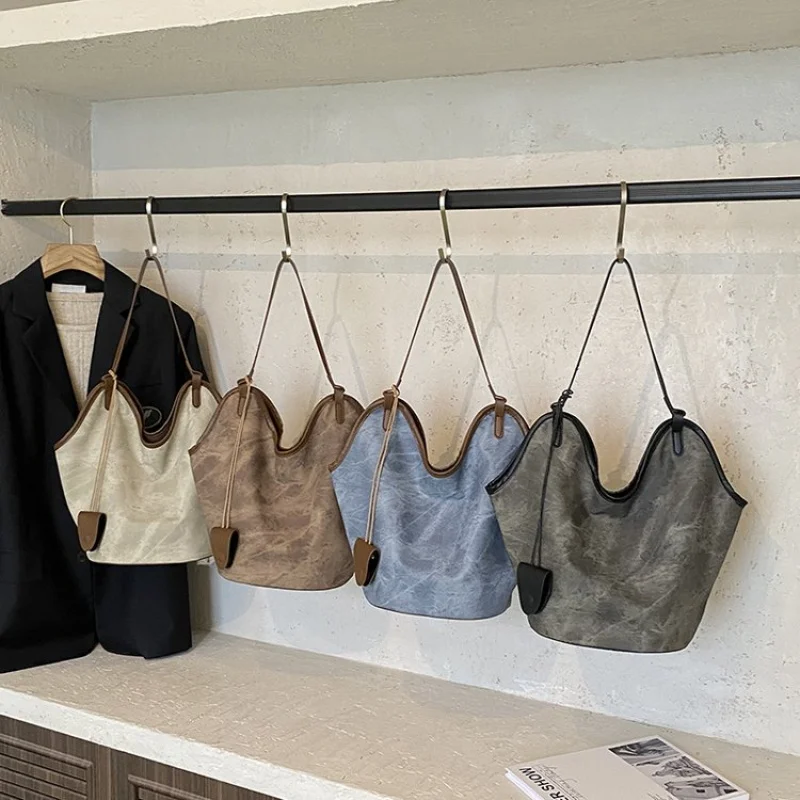 

Luxury Brand Inspired Women Handbag With Signature Pattern For Fashionable Outings And Events