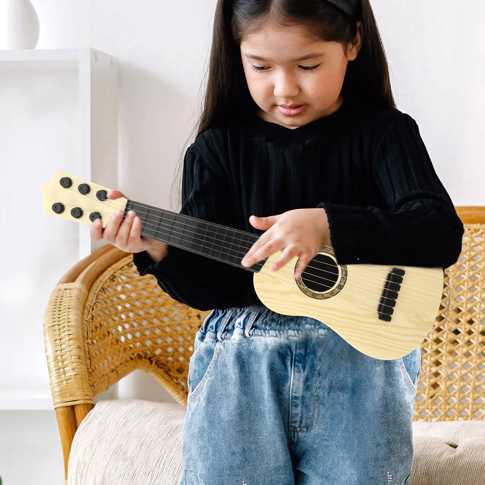 เครื่องดนตรีปริศนากีตาร์ของเล่นเด็กเครื่องดนตรีพลาสติก Ukulele สําหรับเด็ก