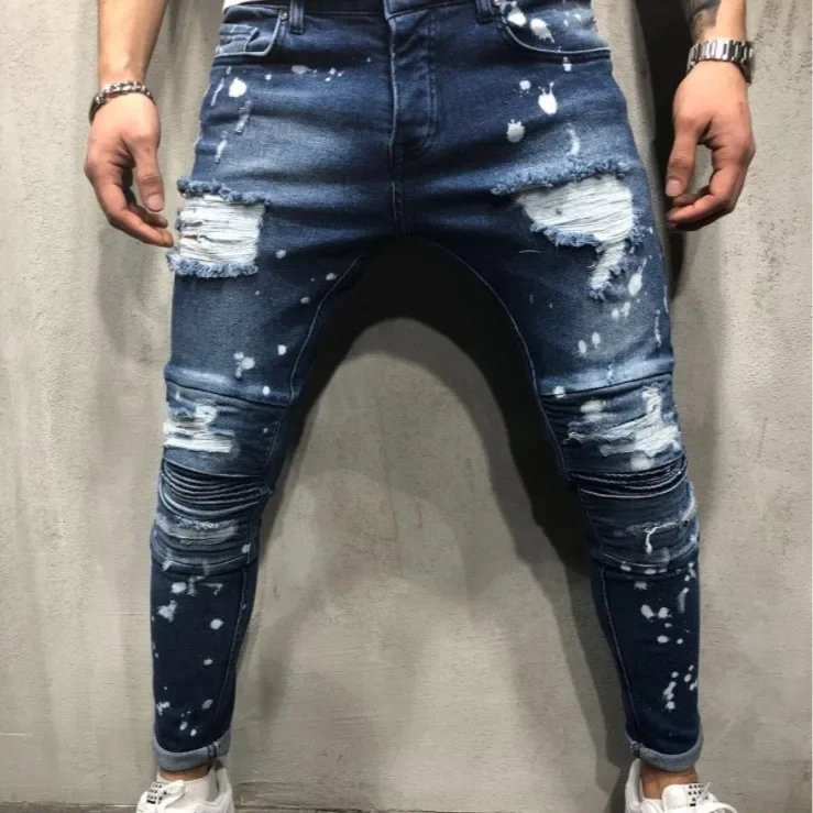 European and American Men's Autumn and Winter Leisure Slim-fit Skinny Jeans with Knee Ripped and Spliced with Splashed Ink Dots.